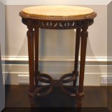 F07. Antique Italian round table with marble top and intricately carved wood legs c. 1920. 29.5”h x 22”w 